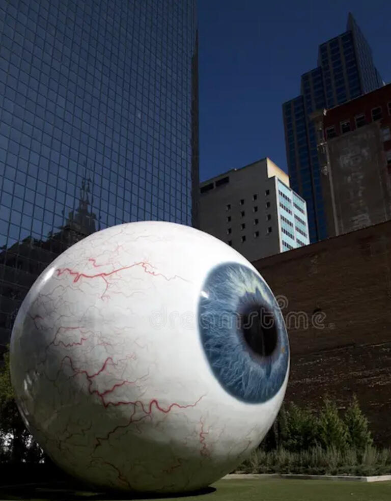 a giant eyeball sculpture sits on a pristine lawn a giant eyeball sculpture sits on a pristine lawn in the middle of downtown dallas this sculpture is where we talk about the eyeball killer a famous serial killer in dallas texas